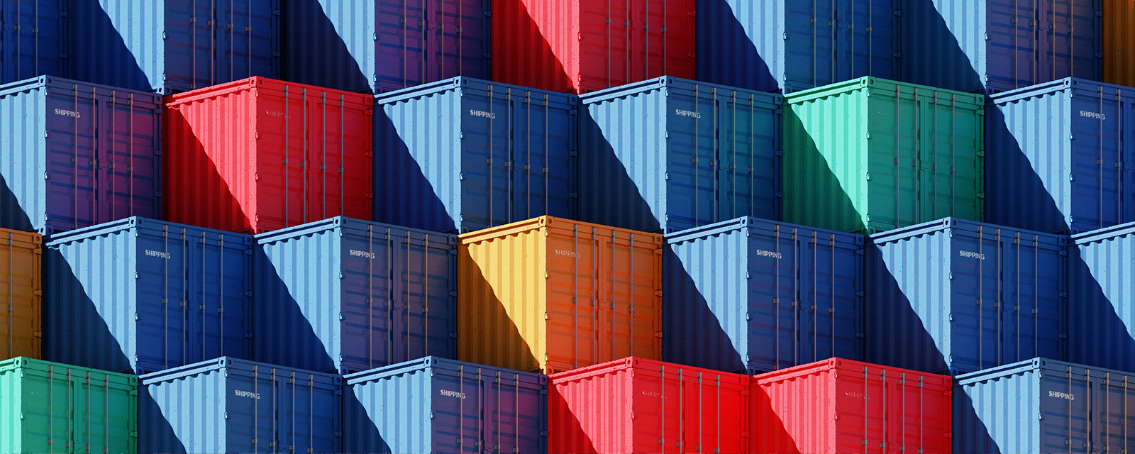Multicolored shipping containers, stacked